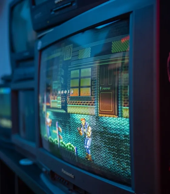 black crt tv turned on in a room