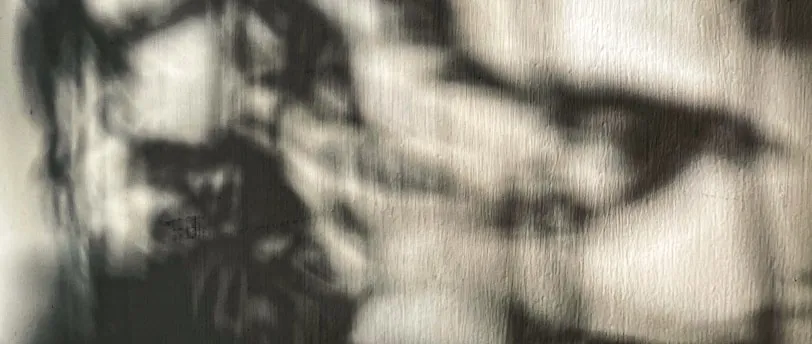 a black and white photo of a woman's face